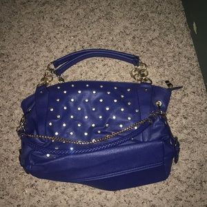Blue and gold studded purse